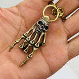 Mini Brass Skull Hand